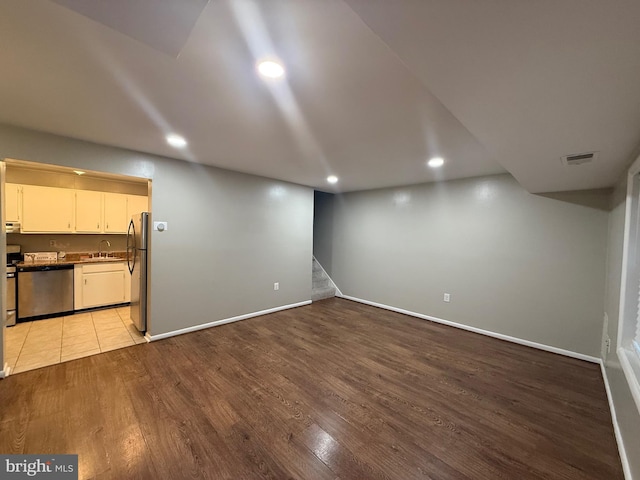 9200 Bridle Path Ln Unit E, Laurel, MD 20723 - unfurnished living room with wood finished floors, recessed lighting, stairs, and baseboards