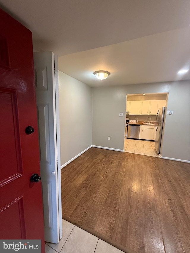 9200 Bridle Path Ln Unit E, Laurel, MD 20723 - unfurnished room with light wood-type flooring and baseboards
