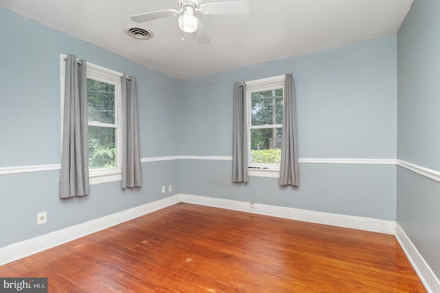 2312 Oak St, Fredericksburg, VA 22401 - empty room featuring healthy amount of natural light, wood finished floors, and ceiling fan