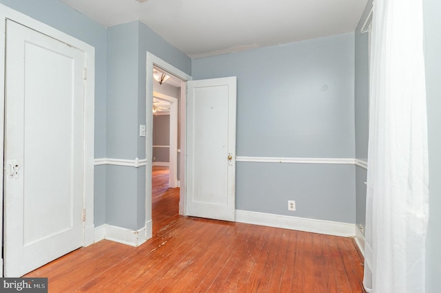 2312 Oak St, Fredericksburg, VA 22401 - unfurnished bedroom featuring wood-type flooring and baseboards