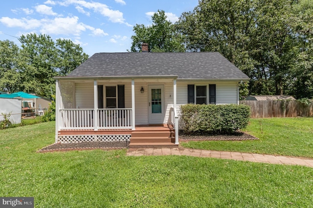 2312 Oak St, Fredericksburg, VA 22401 - bungalow with covered porch, a chimney, and a shingled roof