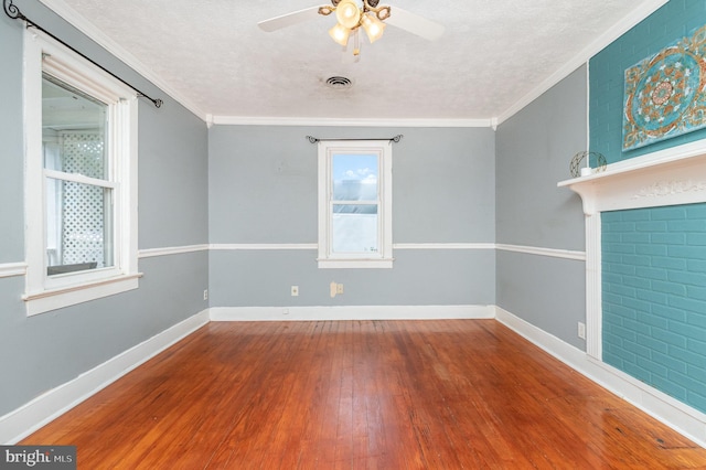 2312 Oak St, Fredericksburg, VA 22401 - empty room with hardwood / wood-style flooring, ceiling fan, a textured ceiling, and ornamental molding