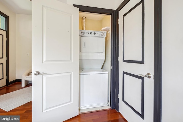531 T St NW Unit 101, Washington, DC 20001 - laundry area with estacked washer and dryer and dark wood-type flooring