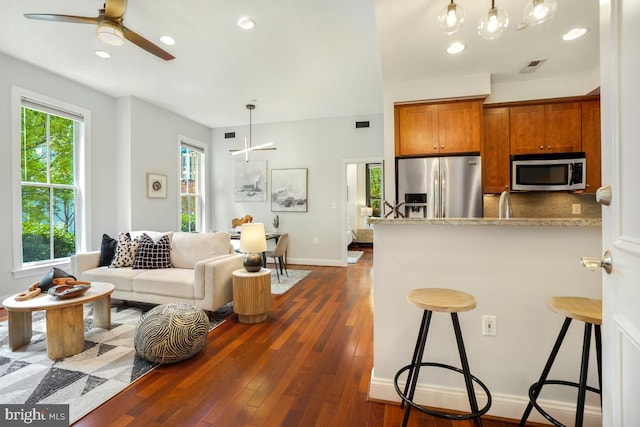 531 T St NW Unit 101, Washington, DC 20001 - living room with ceiling fan, dark wood-style floors, baseboards, and recessed lighting