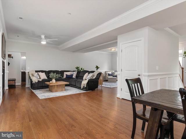 933 Winding Rd, Edgewater, MD 21037 - living area with ceiling fan, ornamental molding, wood finished floors, and stairs