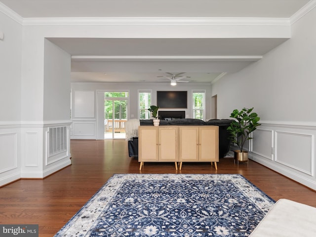 933 Winding Rd, Edgewater, MD 21037 - living area featuring plenty of natural light, wood finished floors, crown molding, a decorative wall, and ceiling fan