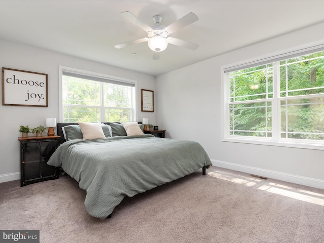 933 Winding Rd, Edgewater, MD 21037 - bedroom featuring baseboards, light colored carpet, and a ceiling fan