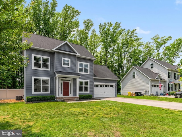 933 Winding Rd, Edgewater, MD 21037 - view of front facade with driveway, an attached garage, and roof with shingles