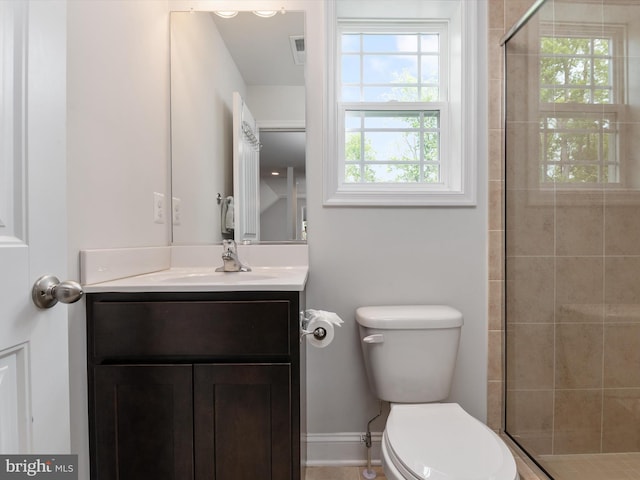 933 Winding Rd, Edgewater, MD 21037 - bathroom featuring vanity, toilet, a shower stall, and baseboards