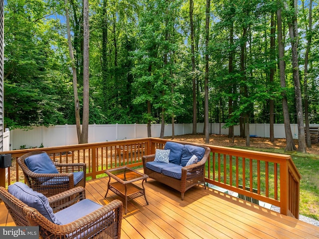 933 Winding Rd, Edgewater, MD 21037 - wooden deck with a fenced backyard and outdoor lounge area