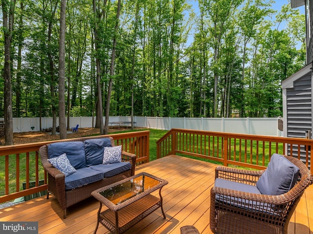 933 Winding Rd, Edgewater, MD 21037 - deck featuring outdoor lounge area and view of scattered trees
