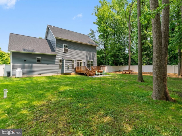 933 Winding Rd, Edgewater, MD 21037 - rear view of property featuring a deck and roof with shingles