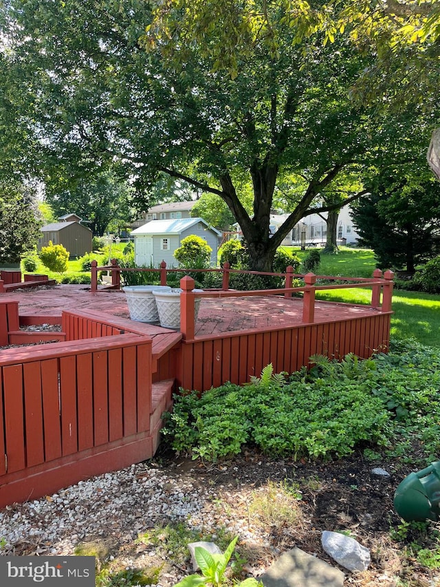 1138 Maple St, Carlisle, PA 17013 - view of yard with a wooden deck and a storage shed