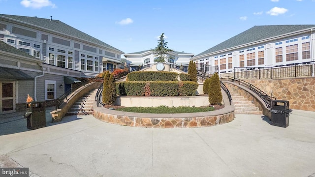 14040 New Acadia Ln Unit 408, Upper Marlboro, MD 20774 - view of home's community featuring stairs and a patio area
