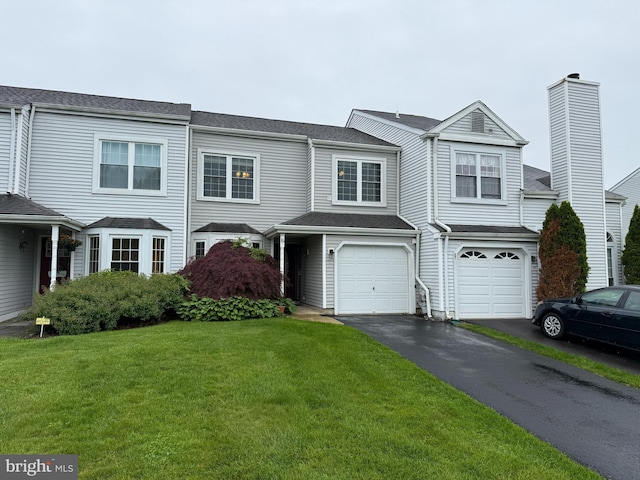 15 E Park Rd, Newtown, PA 18940 - multi unit property with driveway, an attached garage, and a front yard
