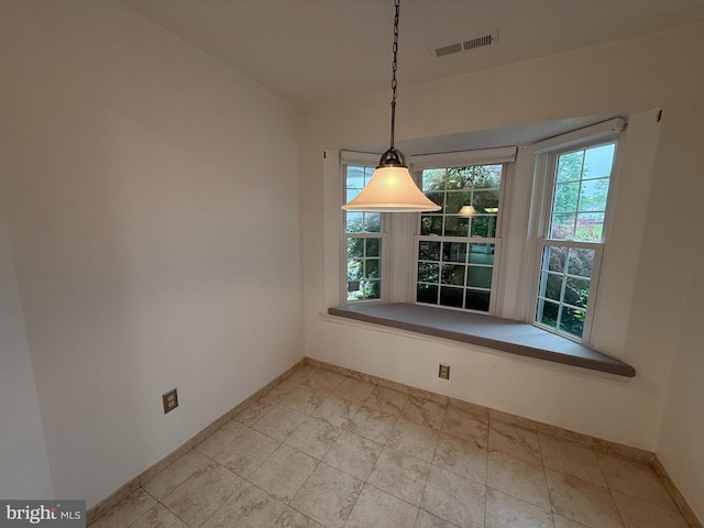 15 E Park Rd, Newtown, PA 18940 - unfurnished dining area featuring baseboards