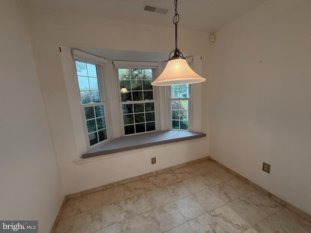 15 E Park Rd, Newtown, PA 18940 - unfurnished dining area with baseboards