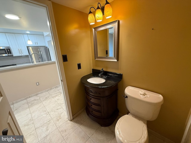 15 E Park Rd, Newtown, PA 18940 - half bathroom with toilet, vanity, and baseboards