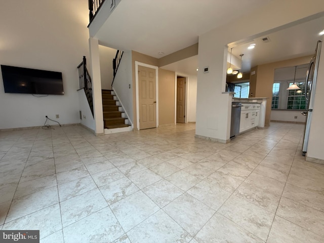 15 E Park Rd, Newtown, PA 18940 - unfurnished living room featuring stairs, baseboards, and light tile patterned floors