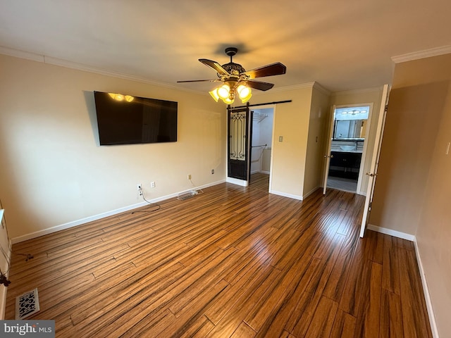 15 E Park Rd, Newtown, PA 18940 - unfurnished living room with wood finished floors, baseboards, ceiling fan, and crown molding
