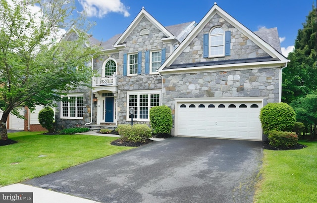 4729 Grand Masters Way, Woodbridge, VA 22192 - view of front facade with stone siding, driveway, a front lawn, and an attached garage