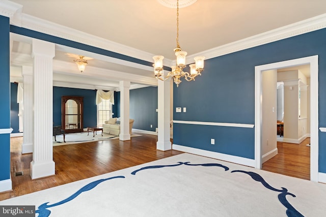 4729 Grand Masters Way, Woodbridge, VA 22192 - unfurnished bedroom with wood finished floors, crown molding, decorative columns, and a chandelier