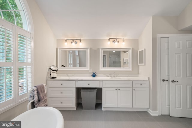 4729 Grand Masters Way, Woodbridge, VA 22192 - bathroom with a soaking tub, vanity, plenty of natural light, and tile patterned flooring
