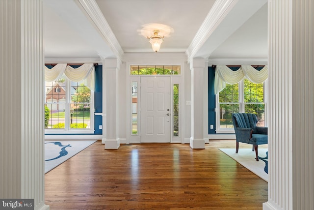 4729 Grand Masters Way, Woodbridge, VA 22192 - foyer entrance with ornate columns, ornamental molding, healthy amount of natural light, and wood finished floors