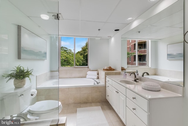 1276 N Wayne St Unit 300, Arlington, VA 22201 - full bath with toilet, a garden tub, tile patterned floors, and vanity