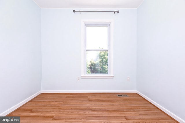 14520 Sorrento Ct, Burtonsville, MD 20866 - empty room featuring light wood-style floors, baseboards, and crown molding