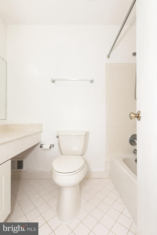 14520 Sorrento Ct, Burtonsville, MD 20866 - full bath with tile patterned flooring, toilet, shower / bathtub combination, and baseboards