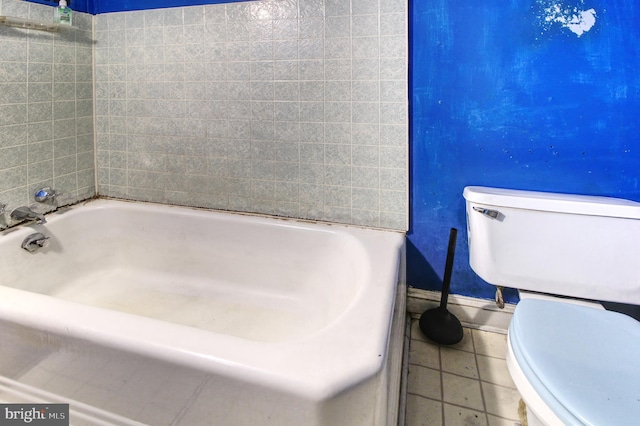 2828 Pelham Ave, Baltimore, MD 21213 - full bath with toilet, baseboards, and tile patterned floors