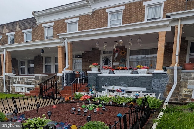 2828 Pelham Ave, Baltimore, MD 21213 - view of front of home featuring a porch and brick siding