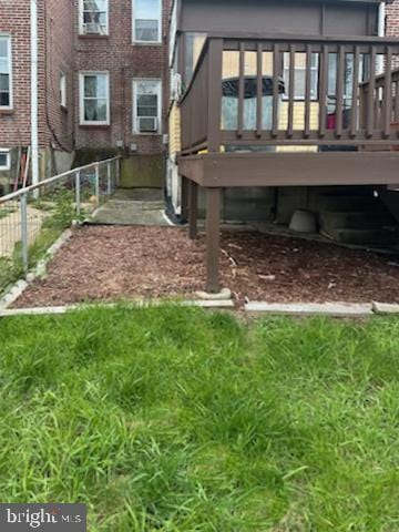2828 Pelham Ave, Baltimore, MD 21213 - rear view of property featuring brick siding and a wooden deck