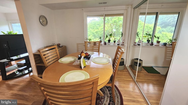 2921 N Leisure World Blvd Unit 418, Silver Spring, MD 20906 - dining area featuring light wood finished floors