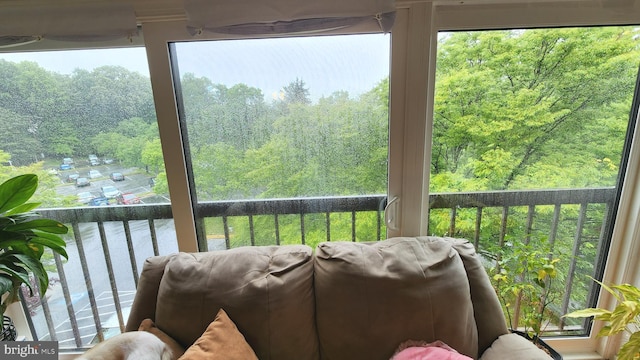 2921 N Leisure World Blvd Unit 418, Silver Spring, MD 20906 - balcony featuring a wooded view