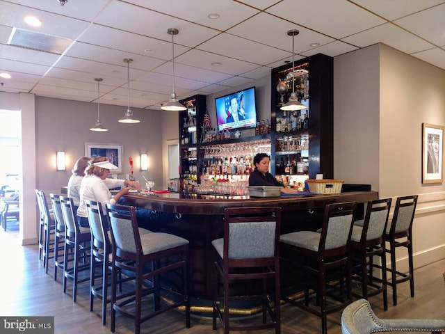 2921 N Leisure World Blvd Unit 418, Silver Spring, MD 20906 - indoor dry bar with wood finished floors and a paneled ceiling