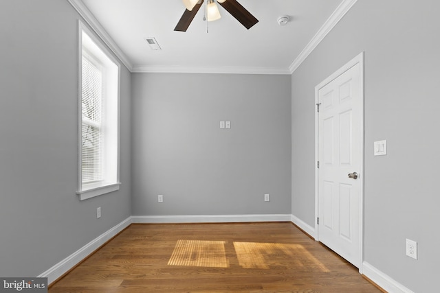 1330 Aisquith St, Baltimore, MD 21202 - empty room with ceiling fan, a smoke detector, crown molding, wood finished floors, and baseboards
