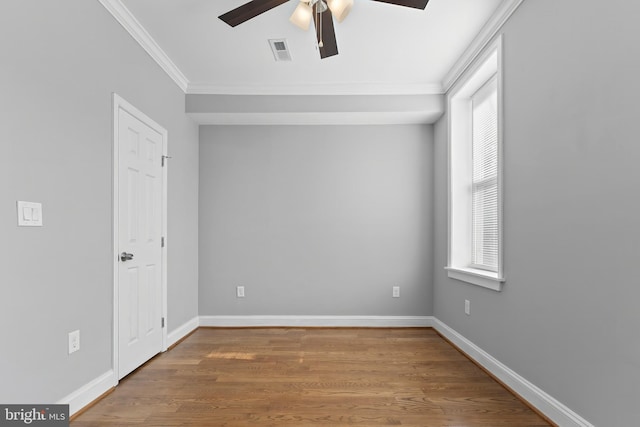 1330 Aisquith St, Baltimore, MD 21202 - empty room with ceiling fan, crown molding, wood finished floors, and baseboards