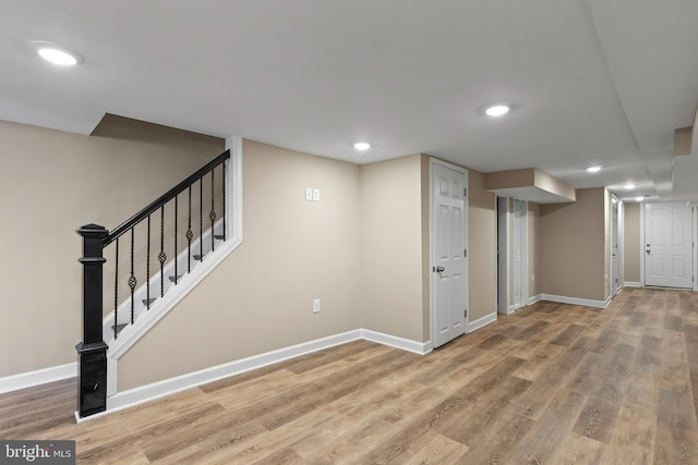 1330 Aisquith St, Baltimore, MD 21202 - finished below grade area featuring recessed lighting, light wood-style flooring, baseboards, and stairway