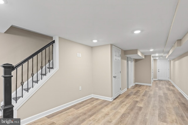 1330 Aisquith St, Baltimore, MD 21202 - finished below grade area with recessed lighting, light wood-style floors, baseboards, and stairs