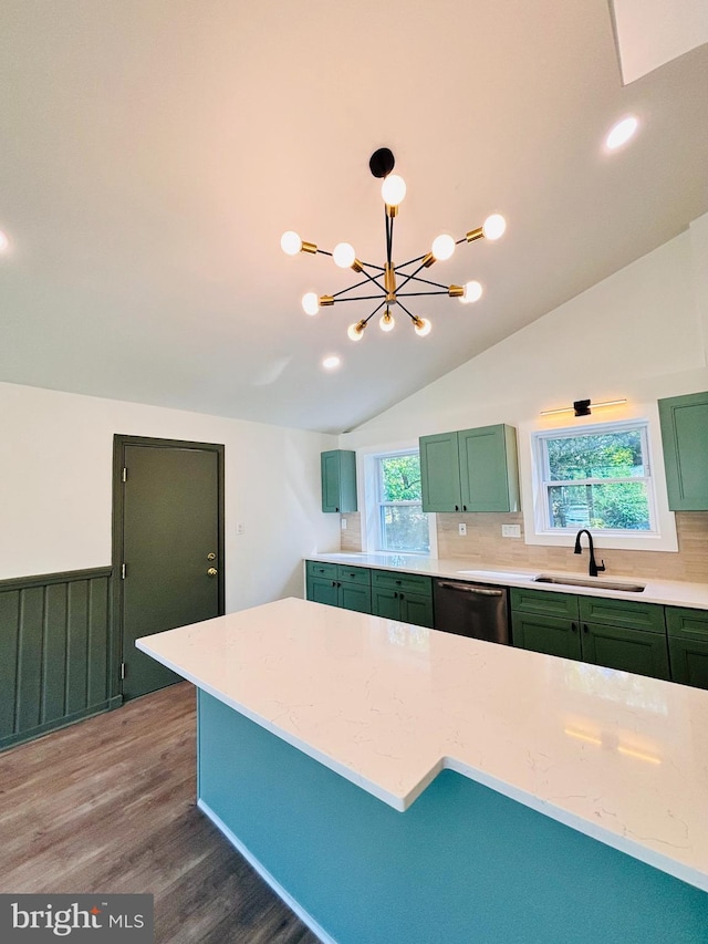13015 Estelle Rd, Silver Spring, MD 20906 - kitchen featuring a sink, green cabinetry, stainless steel dishwasher, wood finished floors, and lofted ceiling