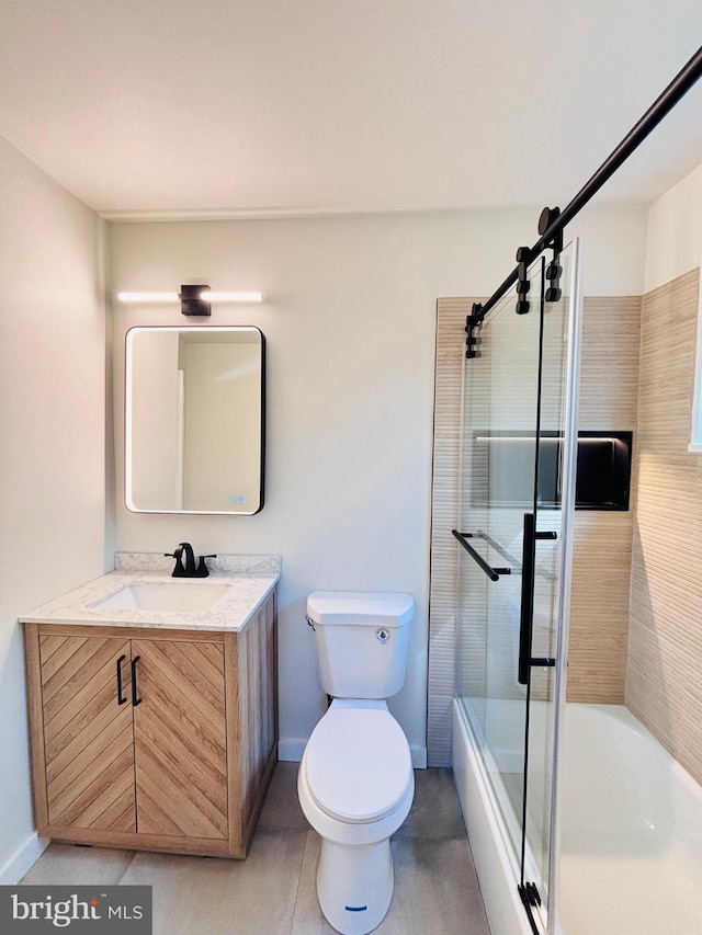 13015 Estelle Rd, Silver Spring, MD 20906 - full bathroom featuring toilet, vanity, baseboards, bath / shower combo with glass door, and tile patterned floors