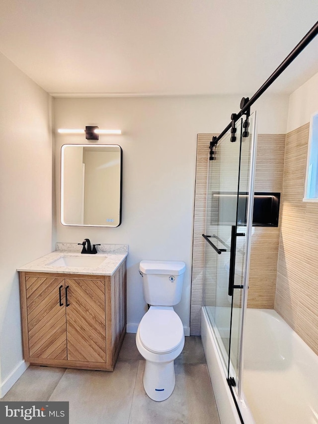 13015 Estelle Rd, Silver Spring, MD 20906 - full bathroom featuring toilet, baseboards, vanity, and combined bath / shower with glass door