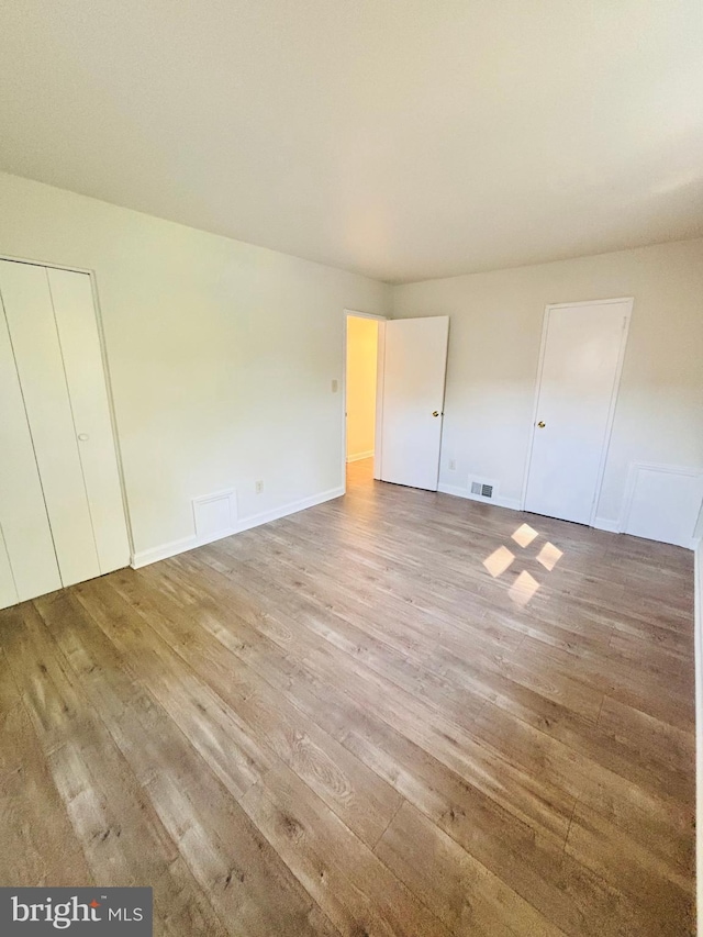 13015 Estelle Rd, Silver Spring, MD 20906 - unfurnished bedroom featuring light wood-type flooring and baseboards