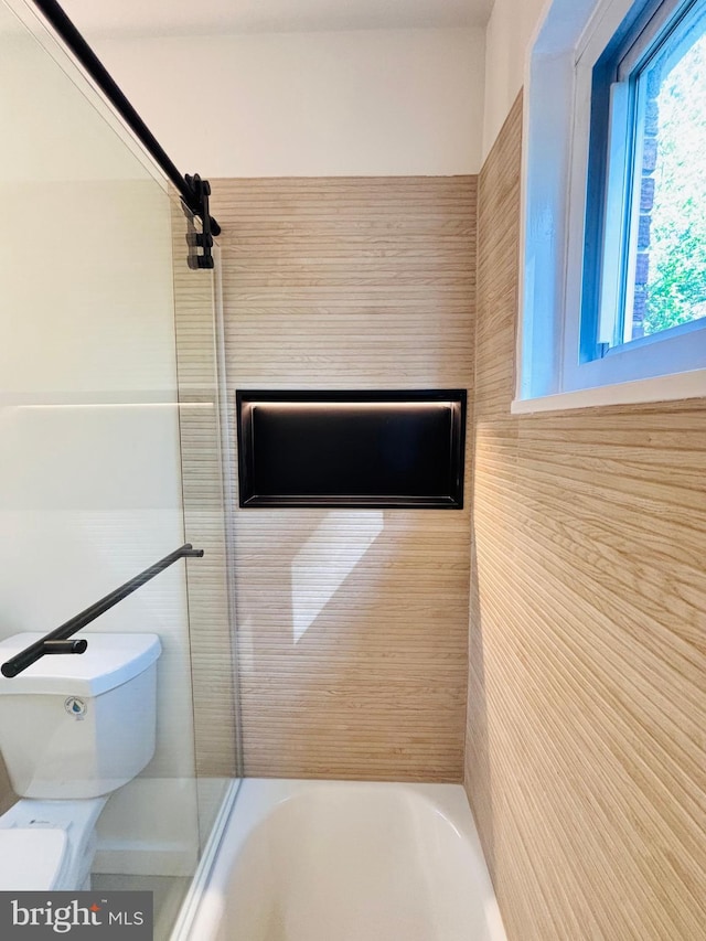 13015 Estelle Rd, Silver Spring, MD 20906 - bathroom featuring toilet and shower / washtub combination