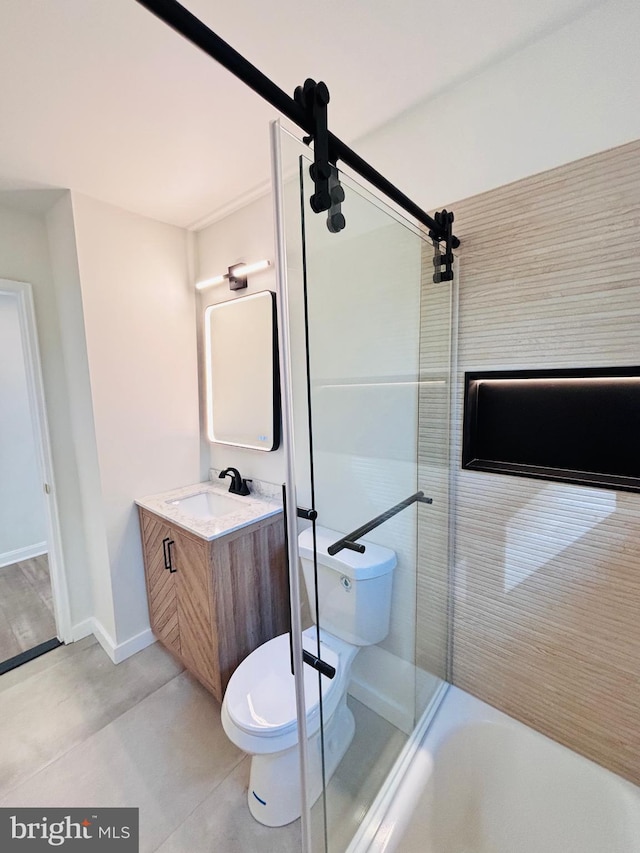 13015 Estelle Rd, Silver Spring, MD 20906 - full bath with toilet, vanity, baseboards, and washtub / shower combination