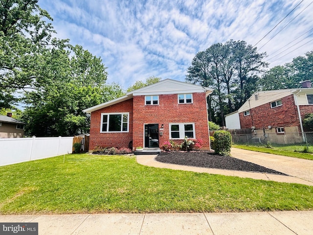 13015 Estelle Rd, Silver Spring, MD 20906 - split level home featuring brick siding and concrete driveway