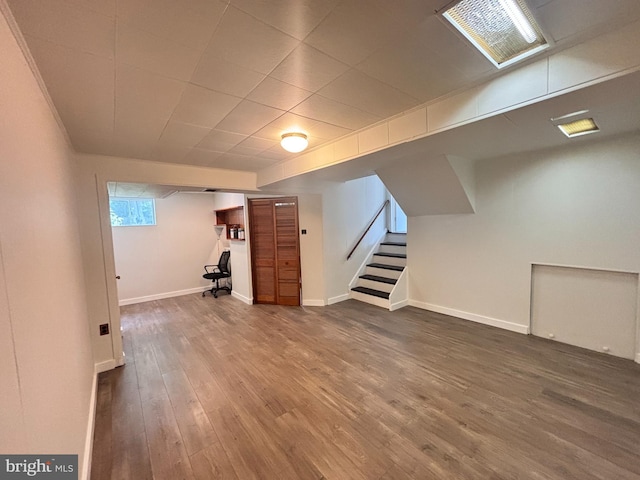 13015 Estelle Rd, Silver Spring, MD 20906 - basement featuring dark wood-type flooring, stairway, and baseboards