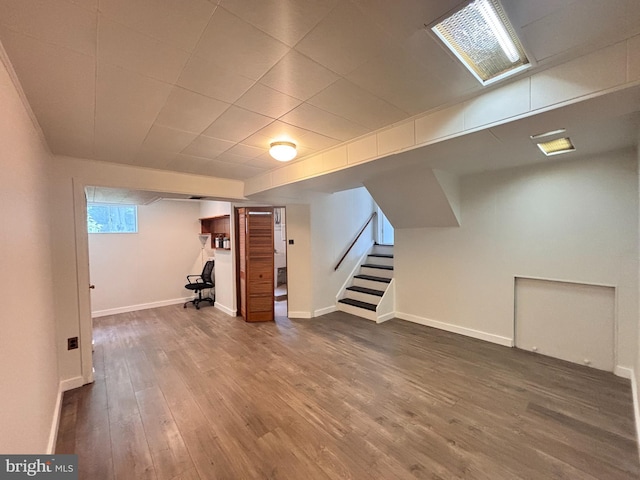 13015 Estelle Rd, Silver Spring, MD 20906 - basement with dark wood-style flooring, stairs, and baseboards
